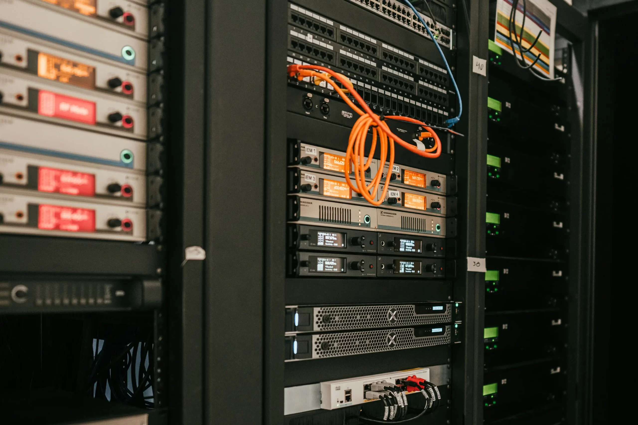 A server rack with network patches and other equipment.